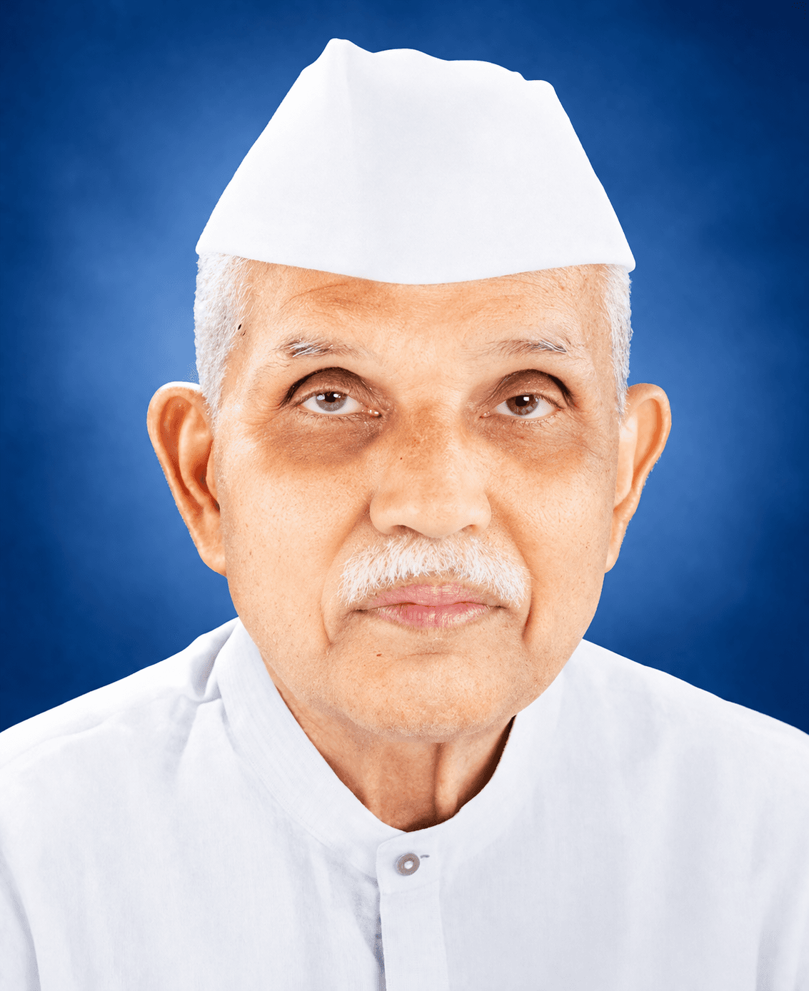 Archival photo of Shri Wanamrao Samant speaking at a public program.